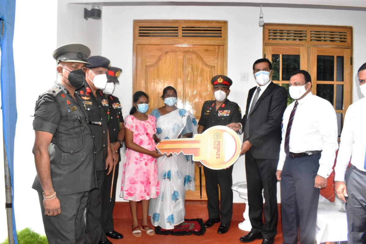 People&#039;s Bank Buddhist Society hands over a brand new home to disadvantaged, low-income family in Vavuniya